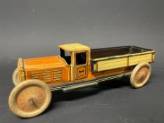 A German tinplate model of a circa 1920s truck.