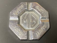 An MG Safety Fast octagonal chrome plated ashtray.