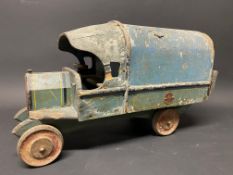 A primitive Tri-ang Toys wooden model of a believed WWI covered wagon.