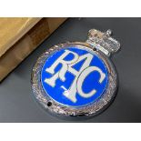An RAC chrome plated brass and enamelled badge, brand new old stock in original box.