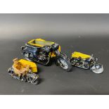 A Zebra Toys die-cast model of an AA motorcycle combination, plus two smaller, one by Dinky Toys.