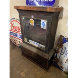 A mahogany counter top display cabinet, as removed from a garage, 24 3/4" w x 35" h x 9 1/2" d.