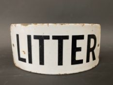 A Litter enamel curved sign, 5 1/2 x 2 1/2".