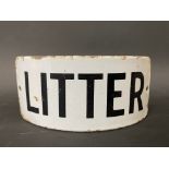 A Litter enamel curved sign, 5 1/2 x 2 1/2".