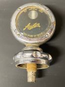 An Austin Boyce Moto Meter, larger version to suit Austin 20.