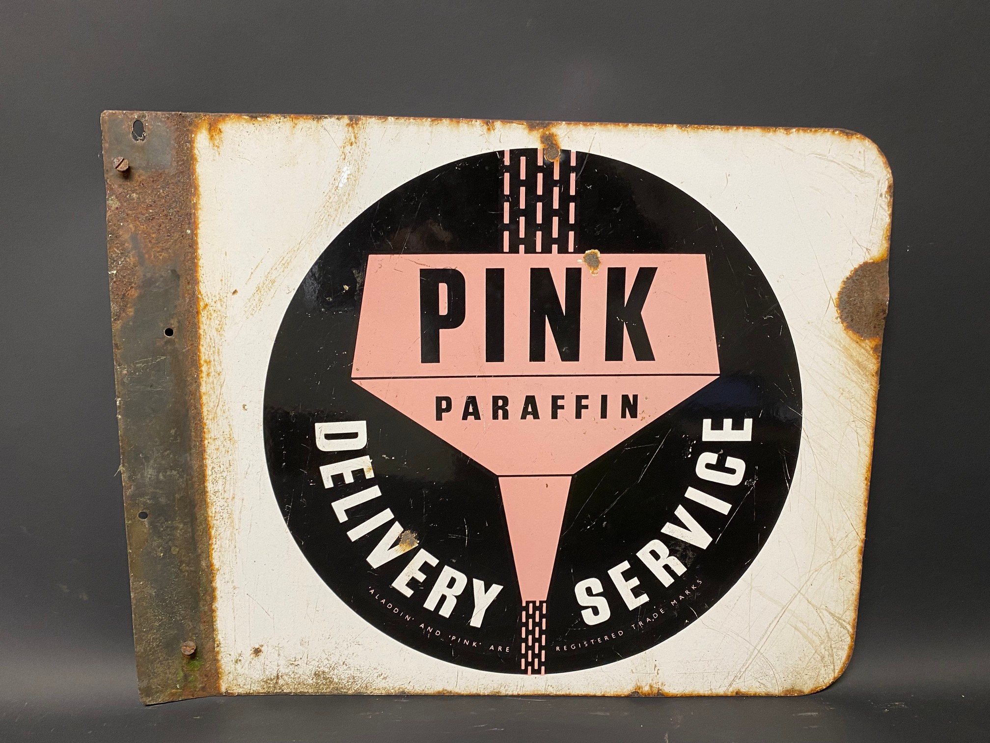 A Pink Paraffin Delivery Service double sided enamel sign with flattened hanging flange, 21 x 16 1/