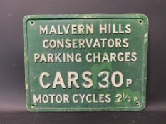 A Malvern Hills Conservators Parking Charges sign, 14 3/4 x 11 3/4".