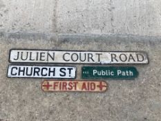 Two road signs, Church St. and Julian Court Road, plus a single sided Public Path directional