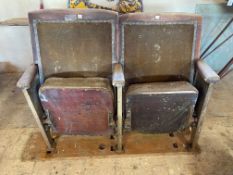 A pair of Art Deco cinema seats.