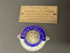 An enamel supply plate for Emrys Bowen & Son, The Garage Llandebie, and a second for Lionel H. Pugh,