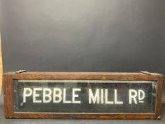 An early bus/tram wooden cased destination reel, with Pebble Mill Rd on show, 38" w x 11" h x 3" d.