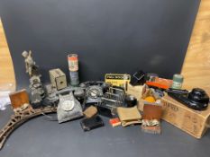 A quantity of collectables including a military concertina action periscope, telephones etc.