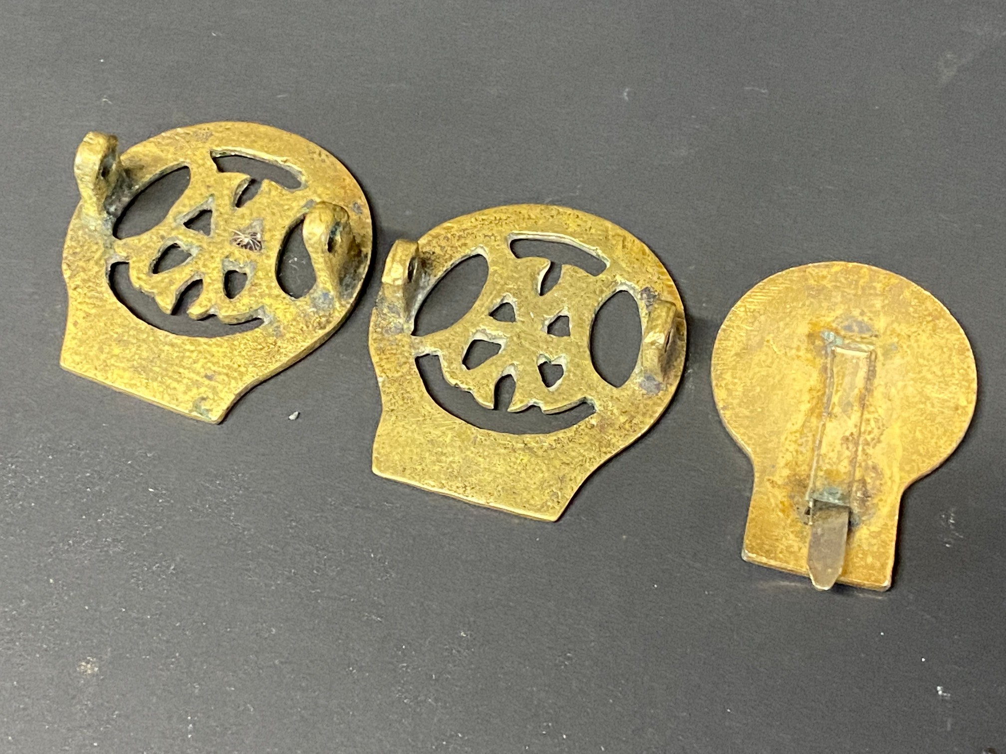 Two early AA brass cap/lapel badges, no.s 1886 and 1049 and one other. - Image 2 of 2