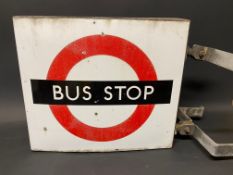 A Bus Stop double sided flag shaped enamel sign with brackets, 18 x 15 1/2" (measurements for sign