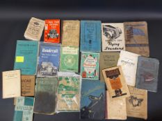 Two boxes of assorted motoring ephemera.