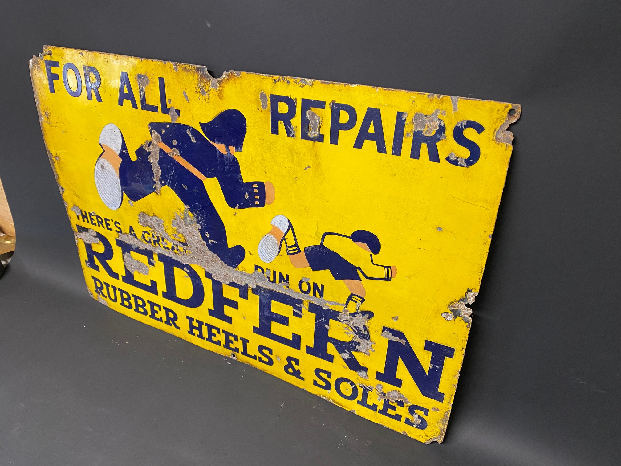 A Redfern Rubber Heels and Soles pictorial enamel sign, 30 x 20". - Image 2 of 3