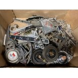 A box of motor car insignia, badges etc.