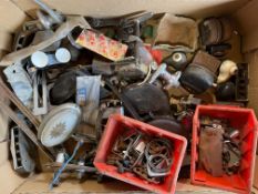 A box of assorted chrome fittings, and small pre-war parts.