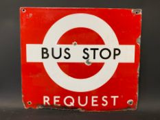 A Bus Stop Request enamel sign, 17 3/4 x 15 1/2".