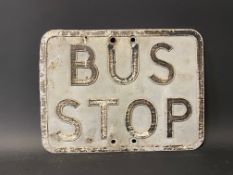 A pressed metal Bus Stop sign, 12 x 9".