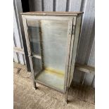 A Chas. F. Thackray Ltd surgical instrument cabinet, 31" w x 60" h x 16 1/2" d.