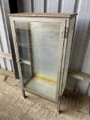 A Chas. F. Thackray Ltd surgical instrument cabinet, 31" w x 60" h x 16 1/2" d.