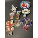 A selection of assorted car badges including Dominion Automobile Association, Royal Air Forces