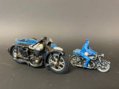 An RAC die-cast motorcycle combination and one smaller.