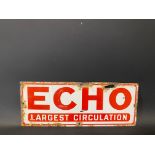 A small enamel sign advertising Echo - Largest Circulation, 18 x 7".