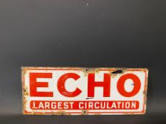 A small enamel sign advertising Echo - Largest Circulation, 18 x 7".