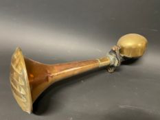A Trico copper and brass horn, with unusual fluted end to the trumpet.