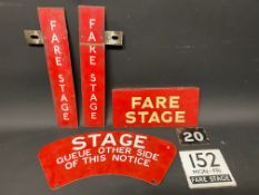 A selection of bus Fare Stage enamel plates, including a no. 152.