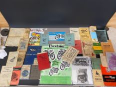 A selection of motorcycle literature including a Royal Enfield Model G list of spare parts, April