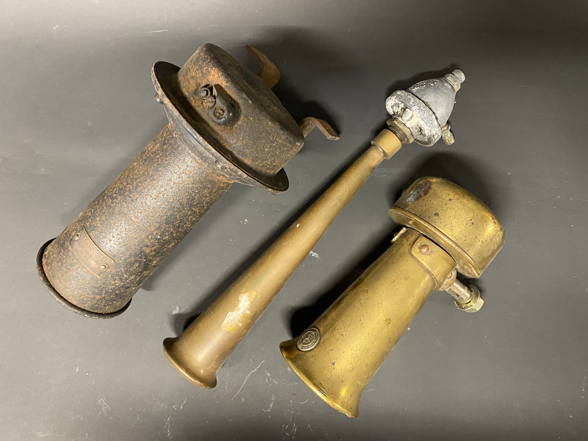 A Bosch electric horn, a Lucas polished brass horn and one other. - Image 2 of 2