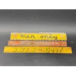 Three shelf advertising strips including 'Men Only'.