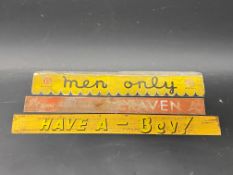 Three shelf advertising strips including 'Men Only'.