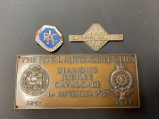 An RAC Blackpool Rally 1938 lapel badge, an RAC Diamond Jubilee Cavalcade 1957 plaque and an RAC