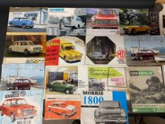 A selection of car brochures including MG, Morris, Wolseley and Ford.