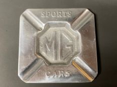 An MG Sports Cars chrome plated ashtray.