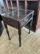 A freestanding display cabinet with fold down access panel to one end, 24 1/2" w x 31" h x 18 1/2"
