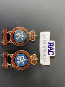 An RAC Superintendent enamel cap badge and two RAC Rally of Great Britain enamel badges with dated
