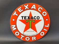 A Texaco Motor Oil circular double sided enamel sign in excellent condition, 20" diameter.