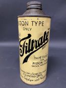 A Filtrate piston type shock absorber fluid quart can.