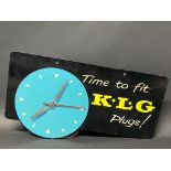 A K.L.G. Plugs garage showroom advertising wall clock, 18 x 10".