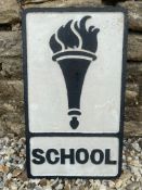 A cast iron road sign for School with torch motif, 12 x 20 1/2".