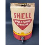 A Shell Upper Cylinder Lubricant five gallon drum with dispensing tap.