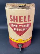 A Shell Upper Cylinder Lubricant five gallon drum with dispensing tap.