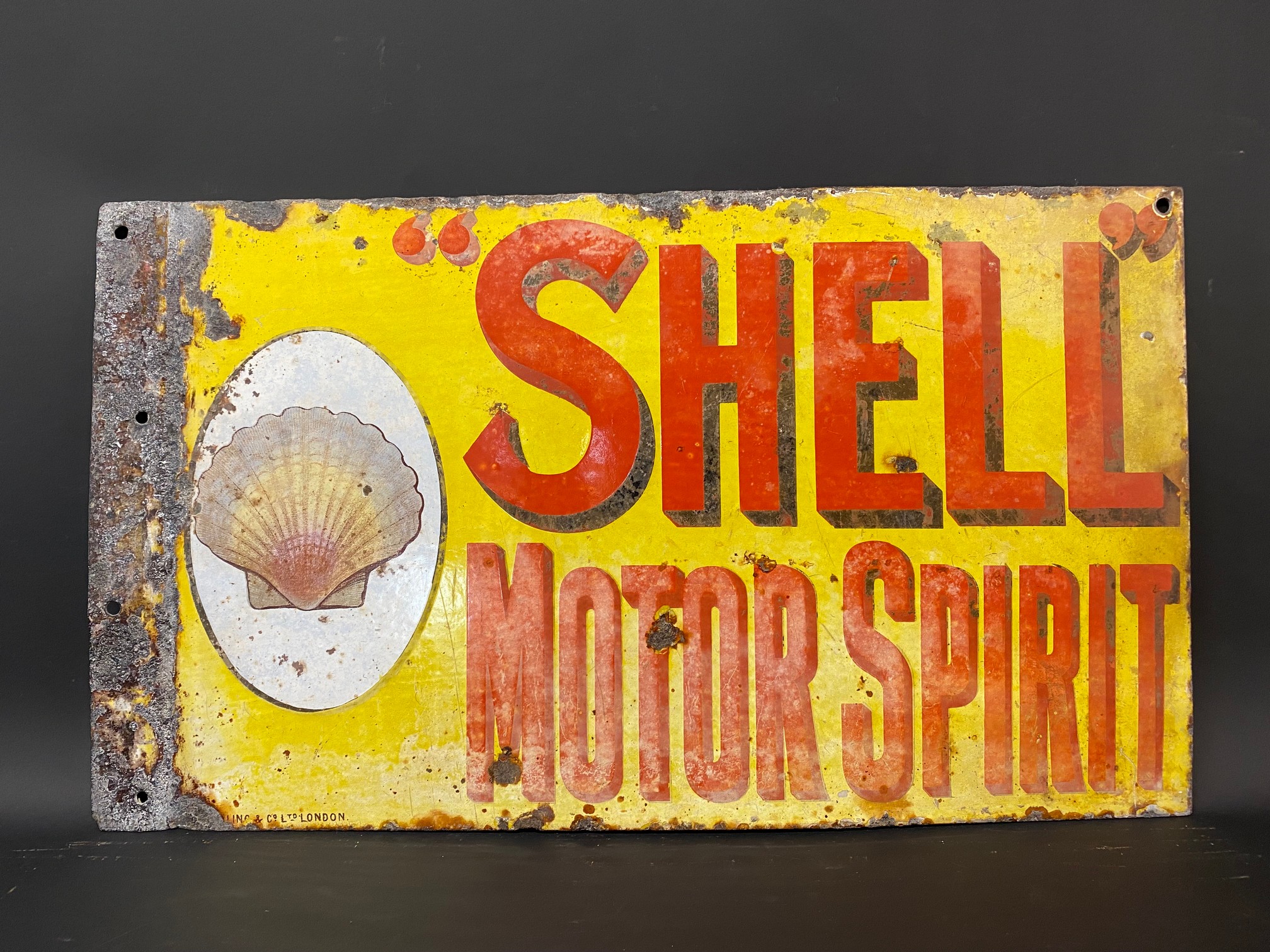 An early Shell Motor Spirit double sided enamel sign with clam motif, made by Willing & Co. Ltd,