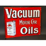 An early Vacuum Motor Car Oils double sided enamel sign with hanging flange, by Wildman & Meguyer,