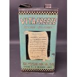A Vigzol Oil Co. Vita Freeze gallon can.